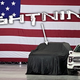 Illustration for article titled Here's A Sneak Peek At Ford's Electric F-150 Lightning Waiting For The President Under A Sheet UPDATED